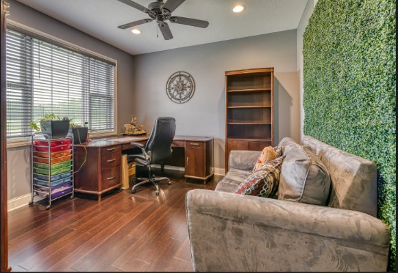 Home office / bonus room with built-in shelving
