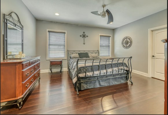 Bedroom with wrought-iron bed frame